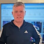 Steve standing in front of a screen